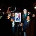 Supporters get their picture taken with a picture of President Obama after he is elected to a second term on Tuesday. Daniel Brenner I AnnArbor.com